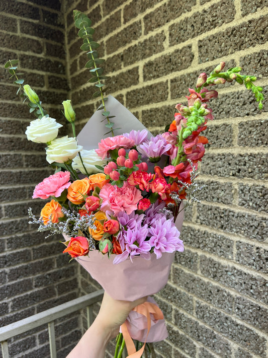 Summer Day Flower Bouquet - Vibrant mixed flower arrangement with snapdragons, lisianthus, carnations, and spray roses for flower delivery in Montreal. Perfect gift from your florist Montreal and fleuriste Verdun.