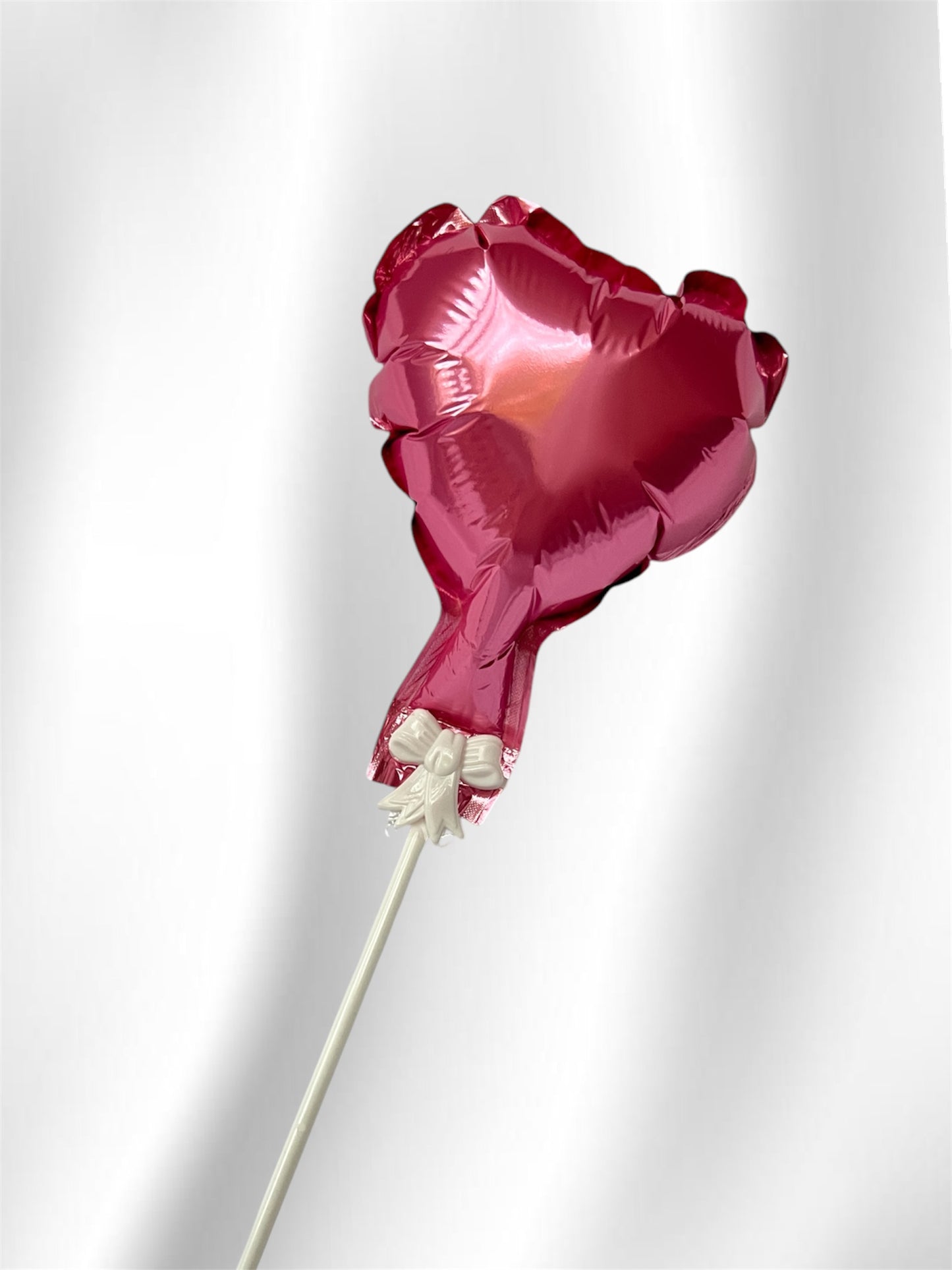 Globo con forma de corazón rosa