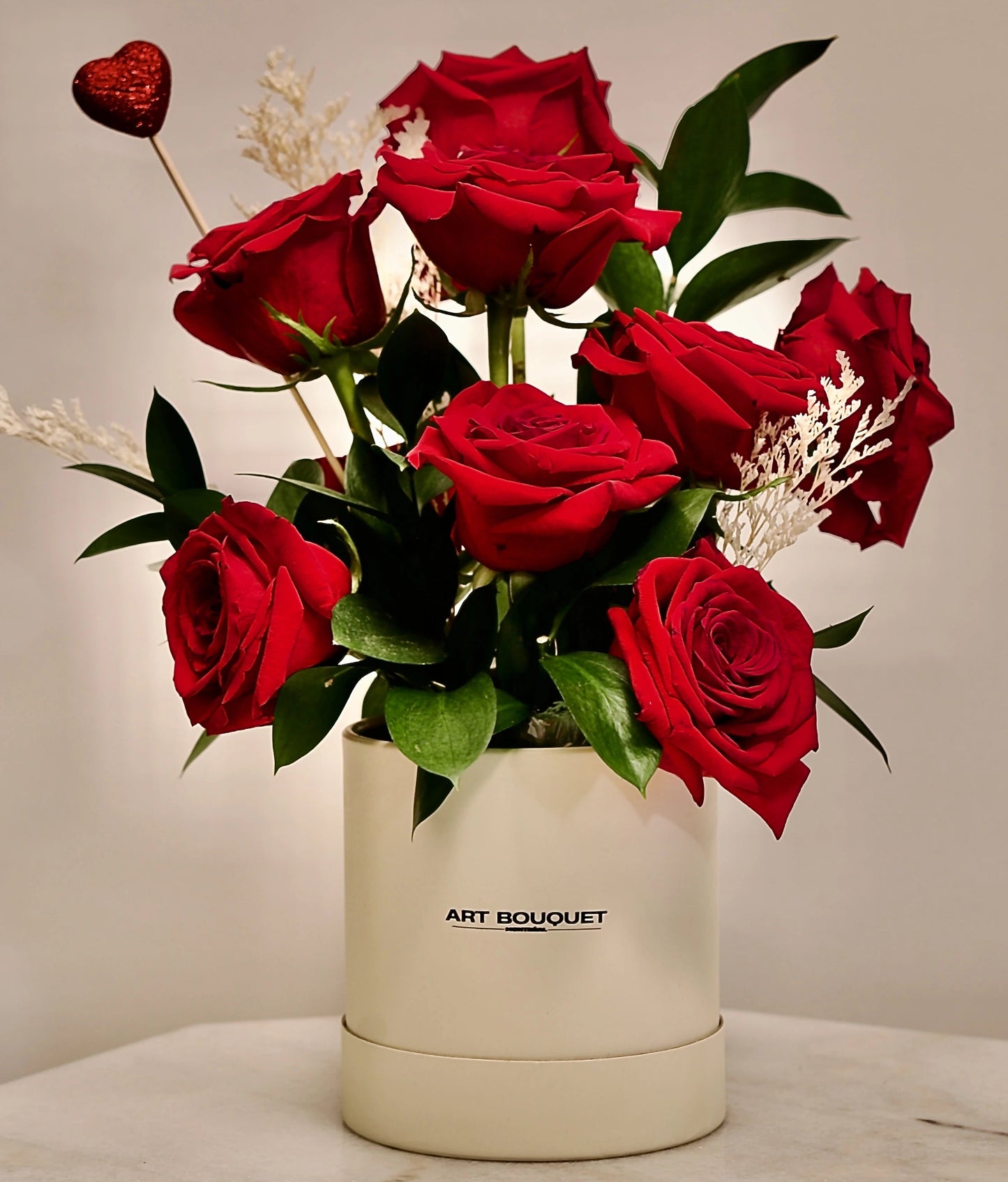 Bouquet of red roses in a beige box. Perfect gift for Valentine's Day, anniversary. Florist Verdun, Montreal, mtl.