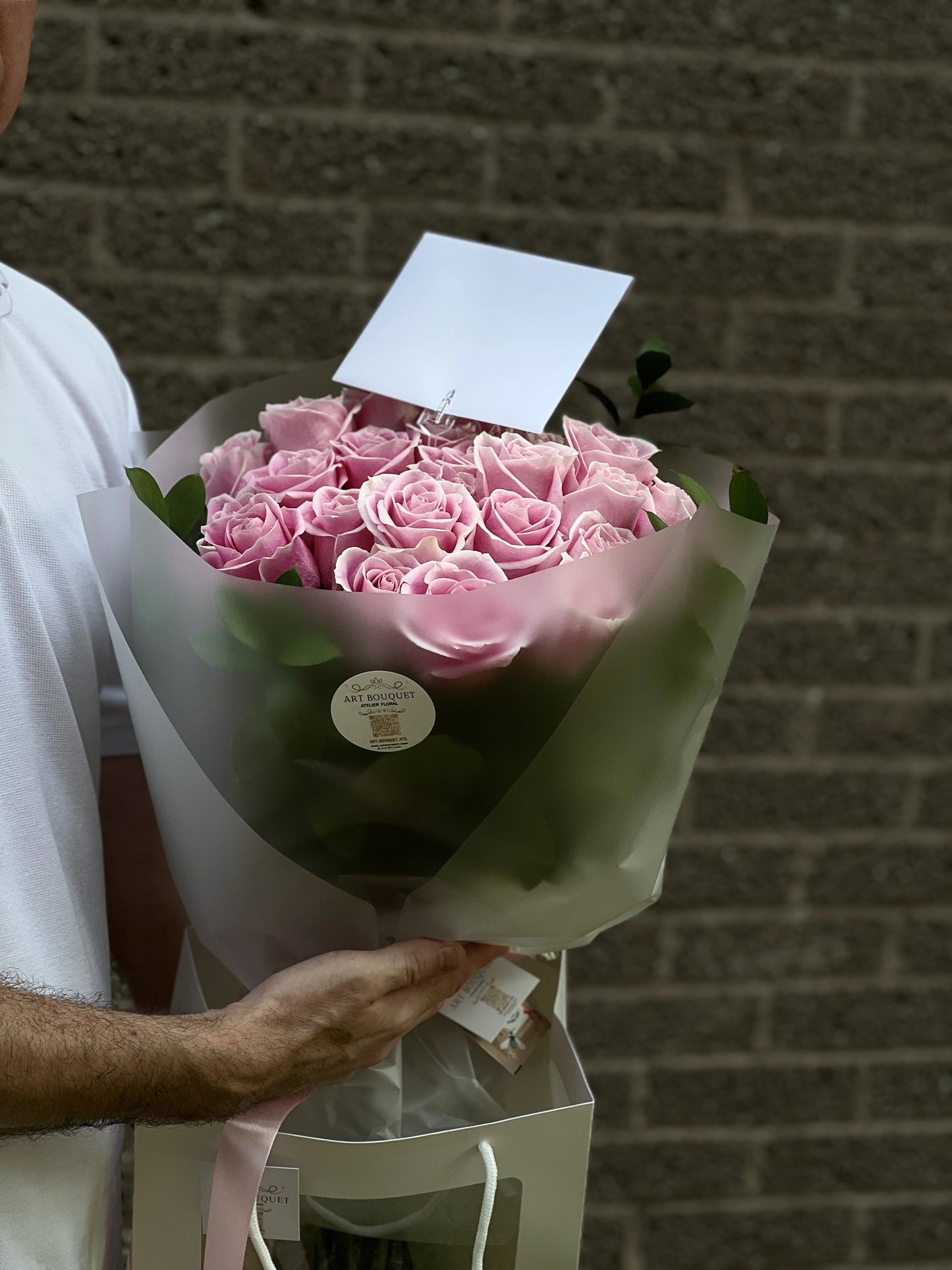 Dreamy pink roses bouquet with green accents. A romantic floral gift or wedding bouquet option available from your Montreal florist.