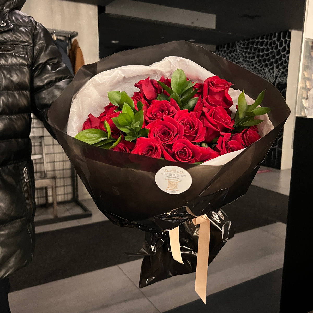 The Art of Roses — premium red roses in black wrapping, signature bouquet Art Bouquet Montreal