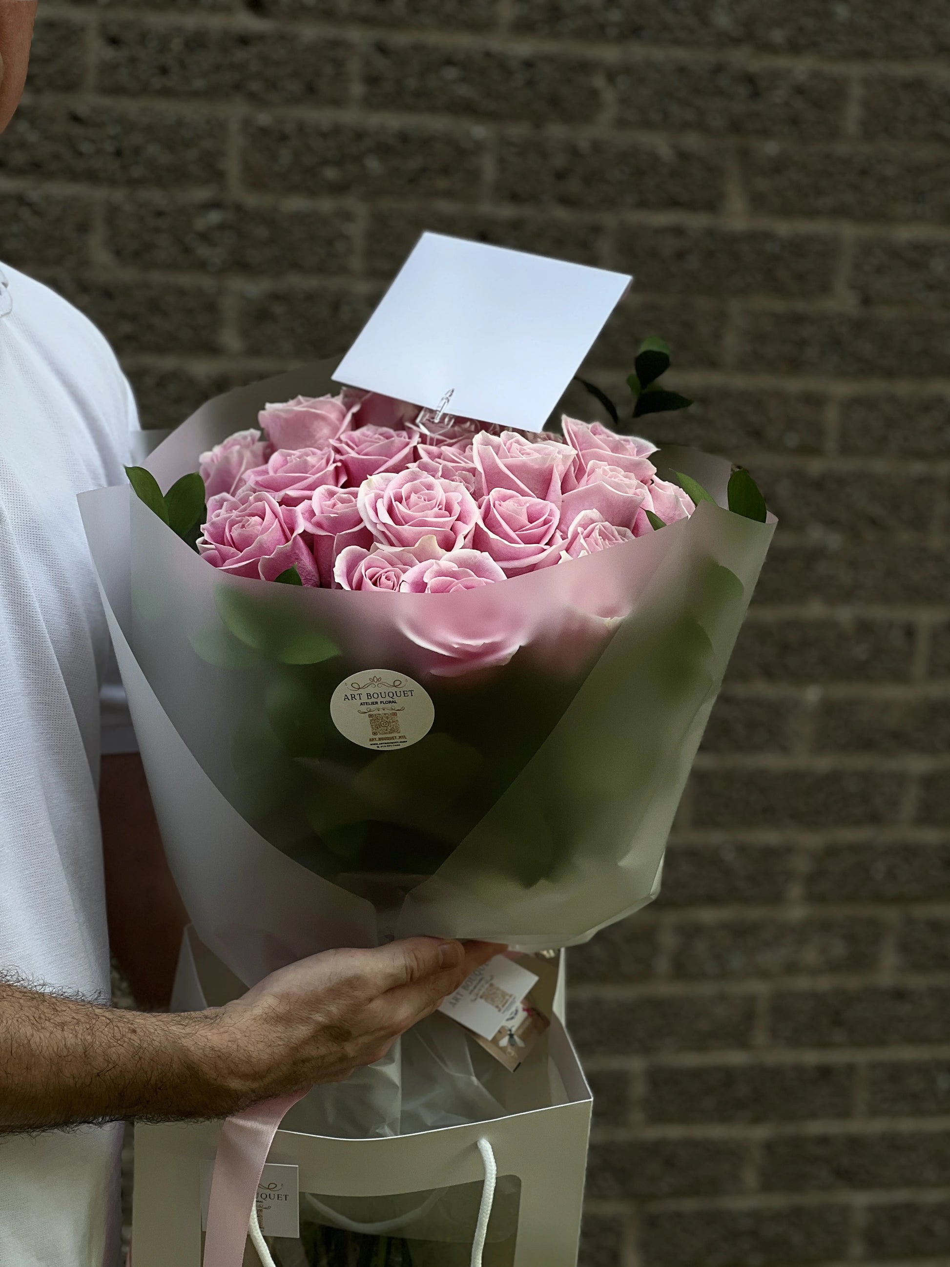 Dreamy pink roses bouquet with green accents. A romantic floral gift or wedding bouquet option available from your Montreal florist.